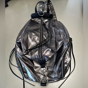 Metallic Silver Backpack with Black Accents
Rebecca Minkoff